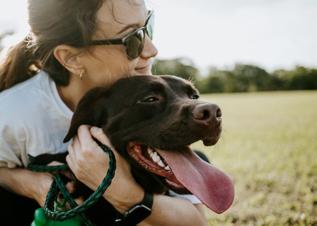 Professional dog walker in Peterborough with her dog